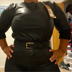 Jbrand leather top / never worn material feels extremely soft . 3/4 sleeves